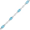 Thumbnail Image 0 of Previously Owned - Oval Swiss Blue Topaz Rope Bracelet in Sterling Silver - 7.5"