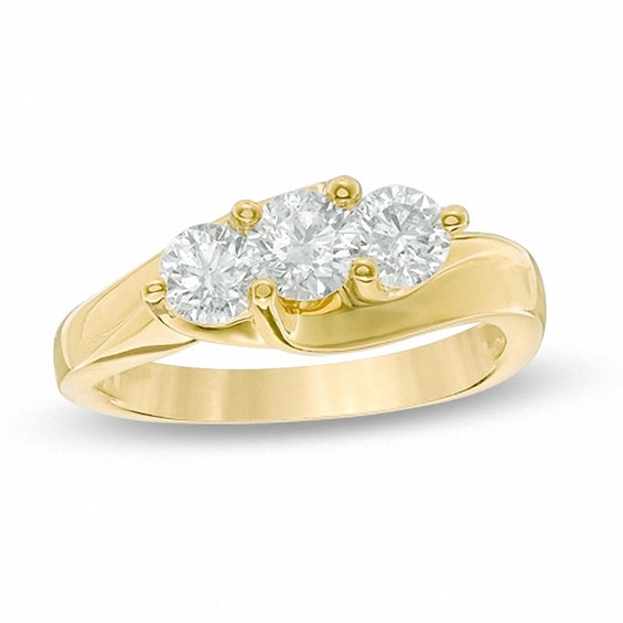 Previously Owned - 1 CT. T.w. Diamond Three Stone Diagonal Ring in 14K Gold