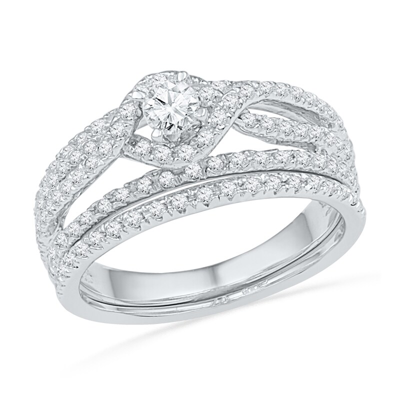 Main Image 1 of Previously Owned - 3/4 CT. T.W. Diamond Twist Frame Bridal Set in 10K White Gold