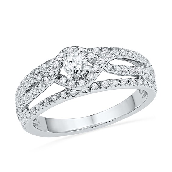 Previously Owned - 3/4 CT. T.w. Diamond Twist Frame Bridal Set in 10K White Gold