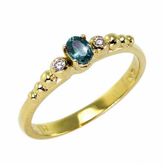 Previously Owned - Oval Alexandrite and Diamond Accent Engagement Ring in 18K Gold