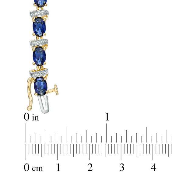 Previously Owned - Oval Lab-Created Blue Sapphire and Diamond Accent Link Bracelet in 10K Gold Vermeil - 7.25"