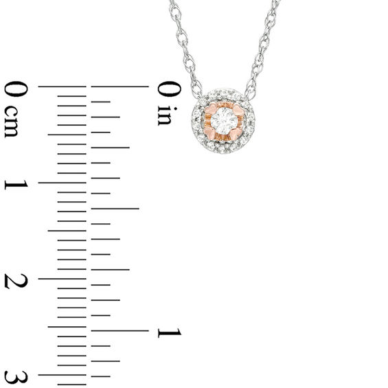 Previously Owned - 1/6 CT. T.w. Diamond Frame Heart-Shaped Prongs Pendant in 10K Two-Tone Gold