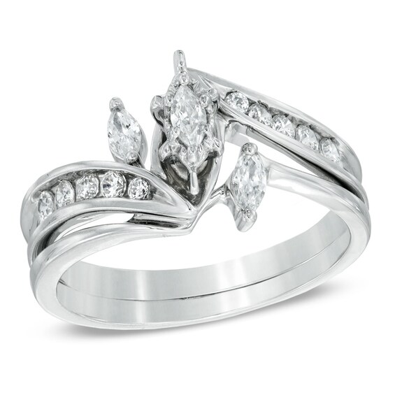 Previously Owned - 1/2 CT. T.w. Marquise Diamond Three Stone Slant Bridal Set in 10K White Gold