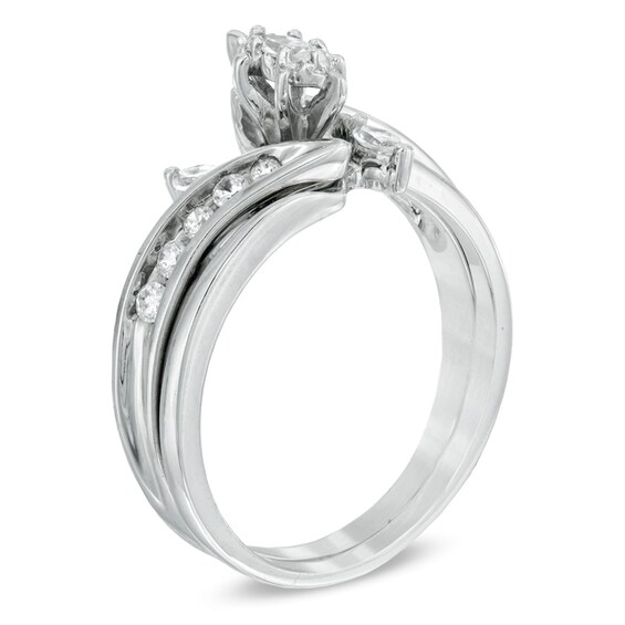 Previously Owned - 1/2 CT. T.w. Marquise Diamond Three Stone Slant Bridal Set in 10K White Gold