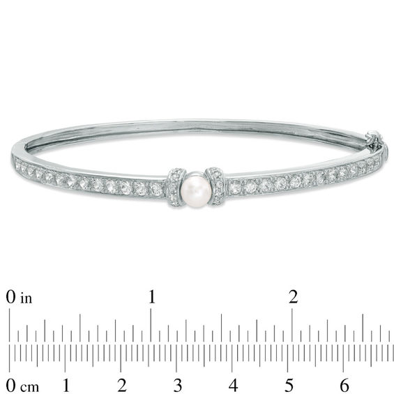 Previously Owned-5.5-6.0mm Freshwater Cultured Pearl and Lab-Created White Sapphire Bangle in Sterling Silver-7.25"