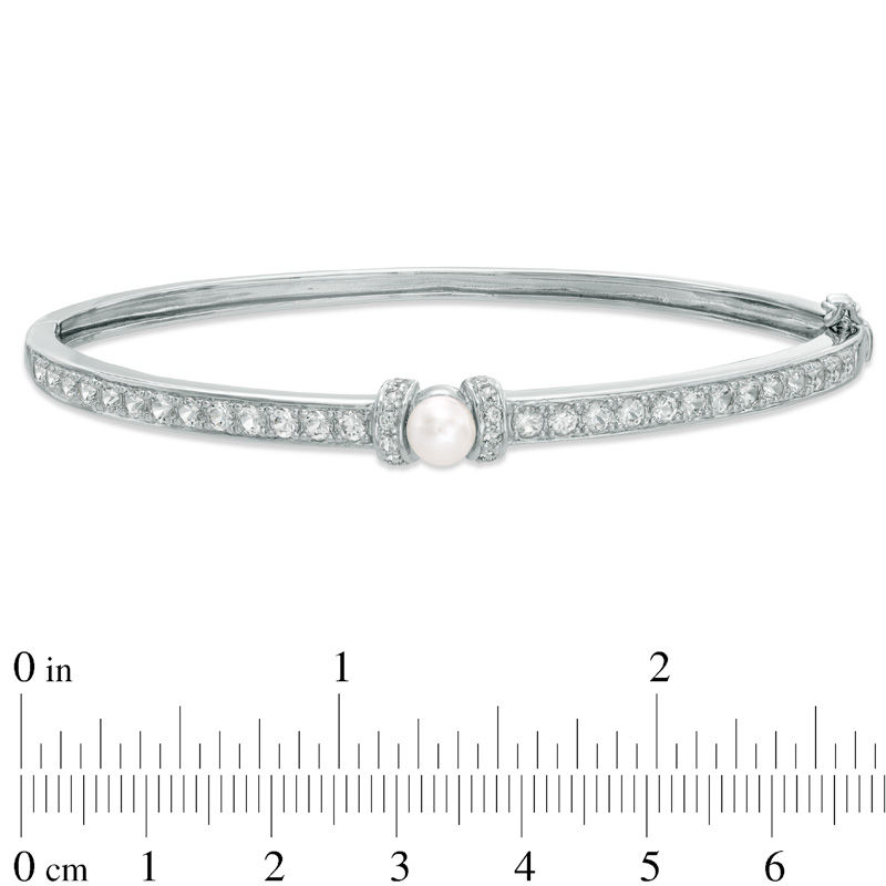 Previously Owned - 5.5 - 6.0mm Cultured Freshwater Pearl and Lab-Created White Sapphire  Bangle in Sterling Silver - 7.25"