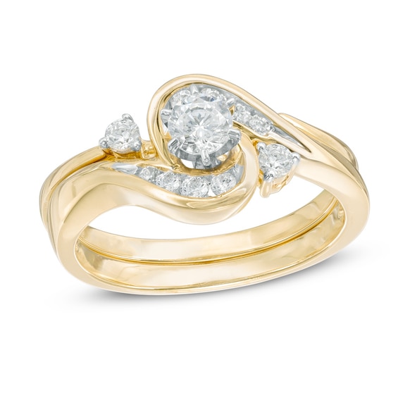 Previously Owned - 1/2 CT. T.w. Diamond Frame Bypass Bridal Set in 10K Gold