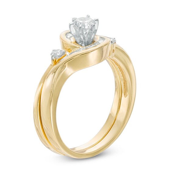 Previously Owned - 1/2 CT. T.w. Diamond Frame Bypass Bridal Set in 10K Gold