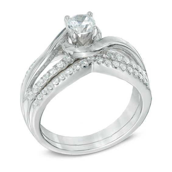Previously Owned - 3/4 CT. T.w. Diamond Swirl Bridal Set in 14K White Gold