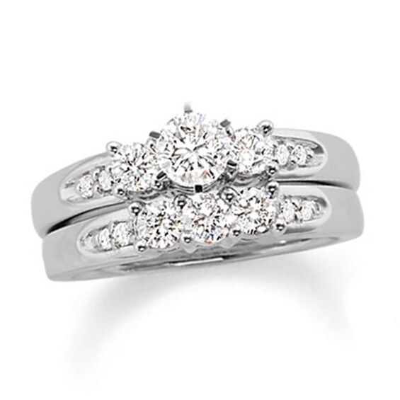 Previously Owned - 1-1/2 CT. T.w. Diamond Three Stone Bridal Set in 14K White Gold
