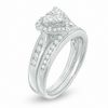 Thumbnail Image 1 of Previously Owned - 5/8 CT. T.W. Heart-Shaped Multi-Diamond Bridal Set in 14K White Gold