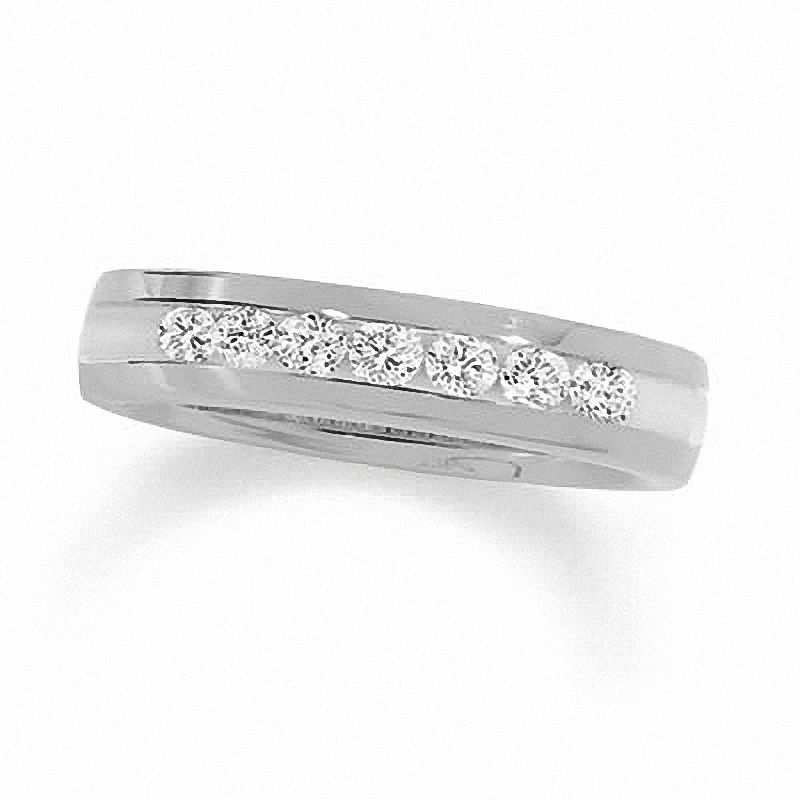 Main Image 1 of Previously Owned - 1/4 CT. T.W. Channel Set Diamond Wedding Band in 14K White Gold