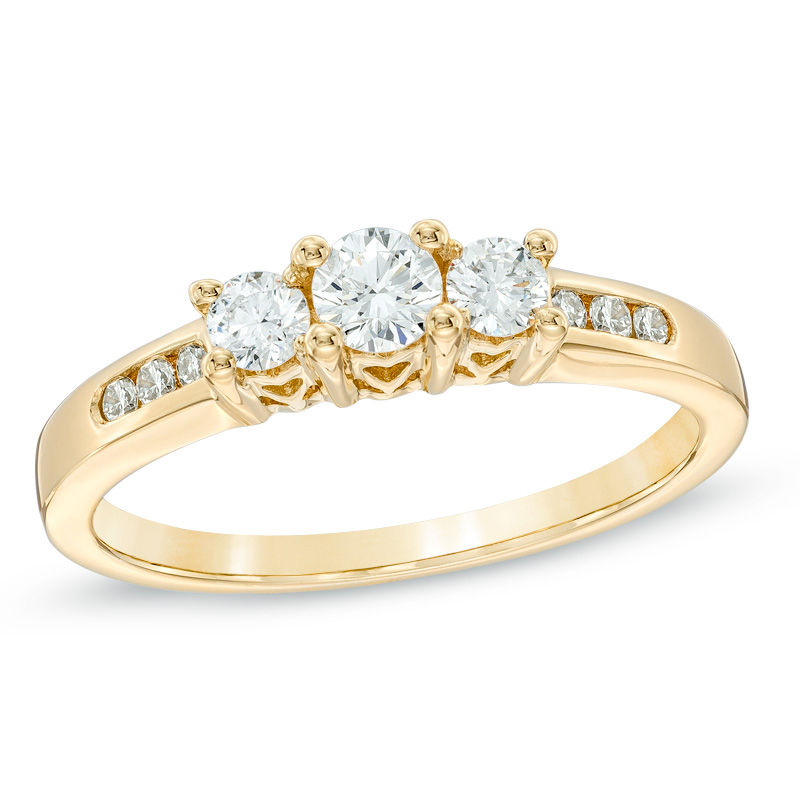 Main Image 1 of Previously Owned - 1/2 CT. T.W. Diamond Past Present Future® Ring in 14K Gold