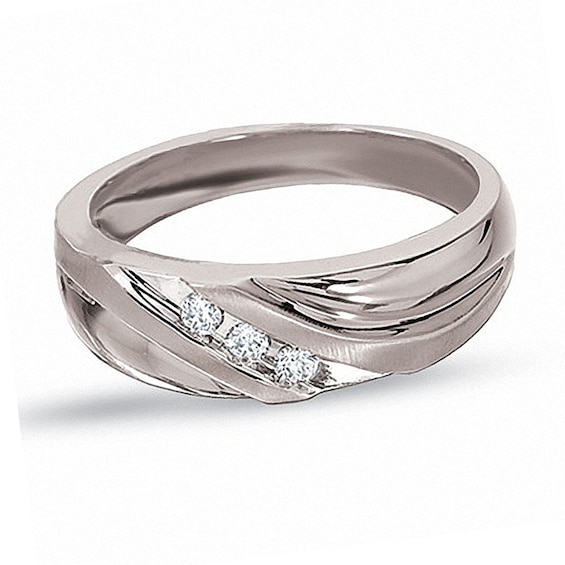 Previously Owned - 1/8 CT. T.w. Diamond Three Stone Wedding Band in 10K White Gold