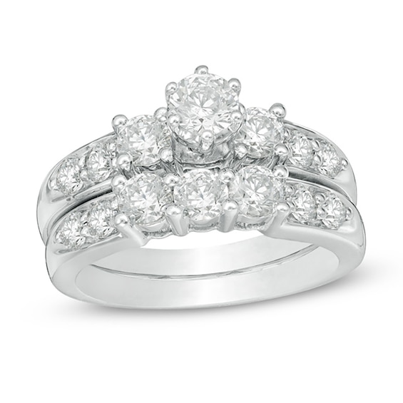 Previously Owned - 2 CT. T.w. Diamond Three Stone Bridal Set in 14K White Gold