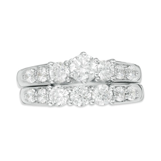 Previously Owned - 2 CT. T.w. Diamond Three Stone Bridal Set in 14K White Gold
