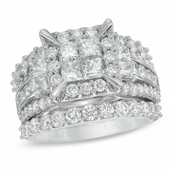 Previously Owned - 4 CT. T.w. Quad Princess-Cut Diamond Frame Three Piece Bridal Set in 14K White Gold