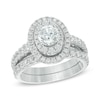 Thumbnail Image 1 of Previously Owned - 2 CT. T.W. Diamond Oval Frame Bridal Set in 14K White Gold