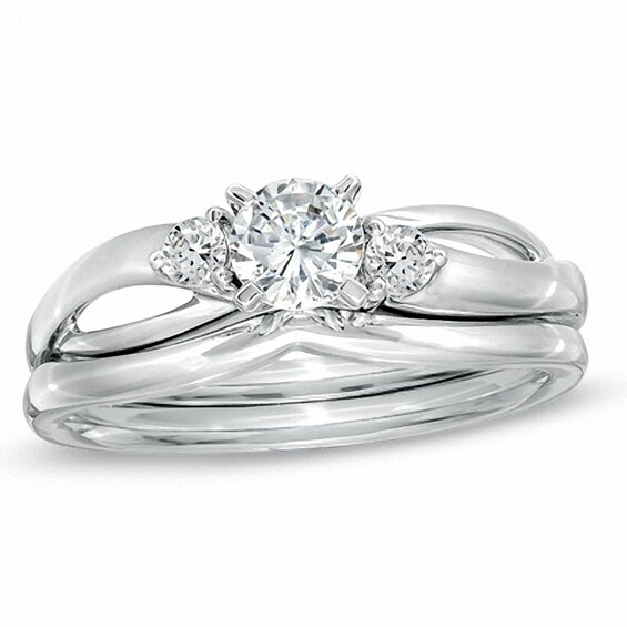 Previously Owned - 1/2 CT. T.w. Diamond Three Stone Split Shank Bridal Set in 14K White Gold (I/Si2)