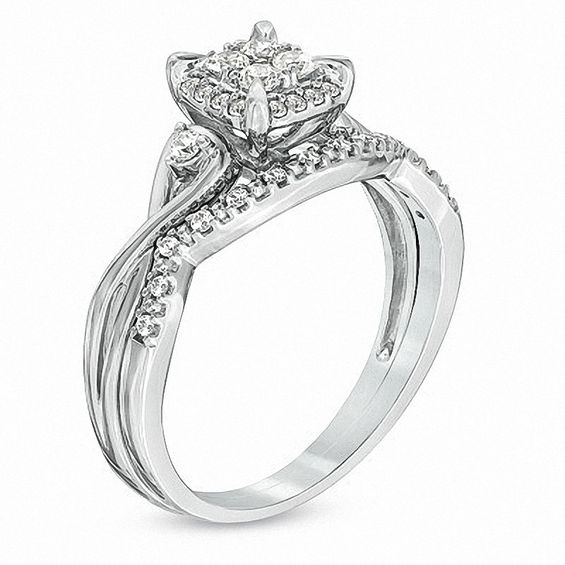 Previously Owned - 1/3 CT. T.w. Diamond Twist Shank Bridal Set in 10K White Gold