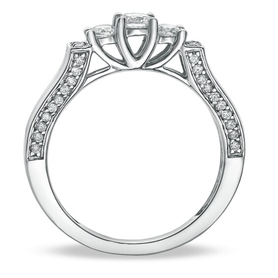 Previously Owned - 1/2 CT. T.w. Diamond Three Stone Band in 10K White Gold