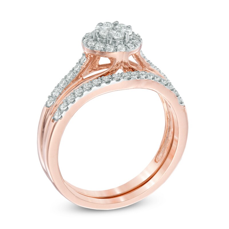 Main Image 2 of Previously Owned - 1/2 CT. T.W. Diamond Cluster Frame Bridal Set in 10K Rose Gold