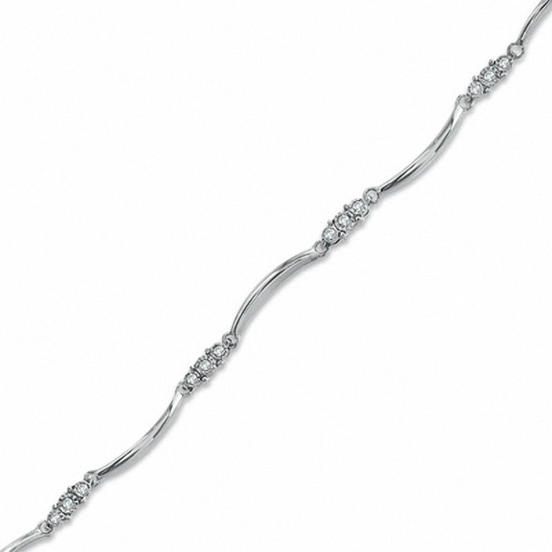 Previously Owned - 1/7 CT. T.W. Diamond Three Stone Station Bracelet in 10K White Gold