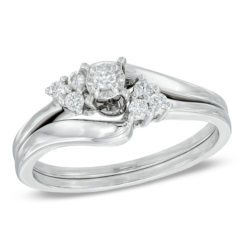 Main Image 1 of Previously Owned - 1/6 CT. T.W. Diamond Three Stone Slant Bridal Set in 10K White Gold