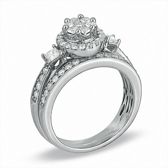 Previously Owned - 1 CT. T.w. Round and Princess-Cut Diamond Flower Bridal Set in 10K White Gold