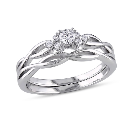 Previously Owned - 1/6 CT. T.w. Diamond Loose Braid Bridal Set in 10K White Gold