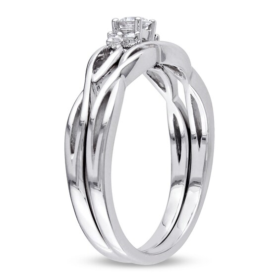 Previously Owned - 1/6 CT. T.w. Diamond Loose Braid Bridal Set in 10K White Gold