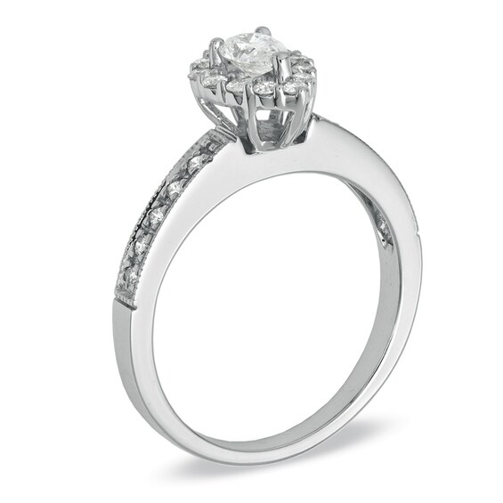 Previously Owned - 5/8 CT. T.w. Pear-Shaped Diamond Frame Engagement Ring in 14K White Gold