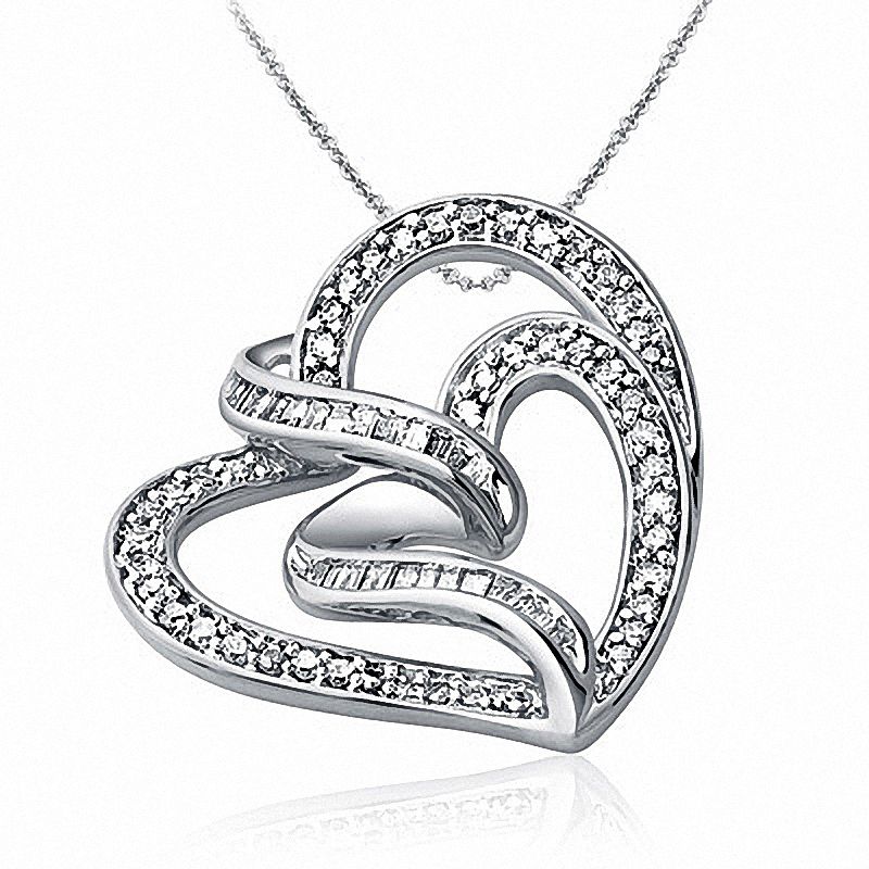 Previously Owned - 1/2 CT. T.W. Baguette and Round Diamond Double Tilted Heart Pendant in 10K White Gold