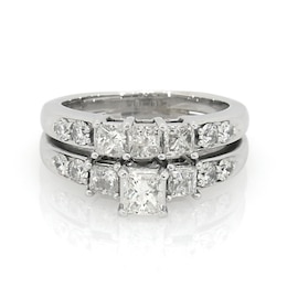 Previously Owned 1-1/2 CT. T.W. Princess-Cut Diamond Three Stone Soldered Bridal Set in 14K White Gold