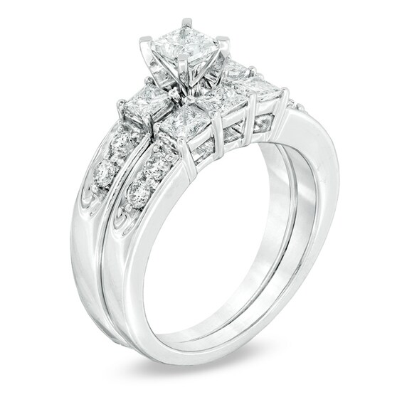 Previously Owned 1-1/2 CT. T.w. Princess-Cut Diamond Three Stone Soldered Bridal Set in 14K White Gold