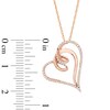 Thumbnail Image 2 of Previously Owned - 1/6 CT. T.W. Diamond Looping Tilted Heart Pendant in 10K Rose Gold