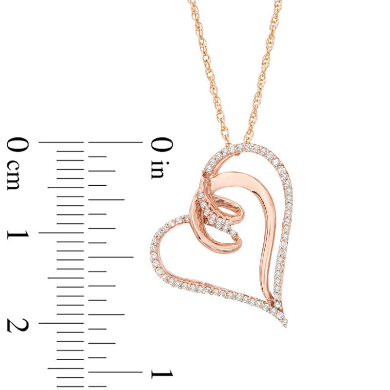 Main Image 2 of Previously Owned - 1/6 CT. T.W. Diamond Looping Tilted Heart Pendant in 10K Rose Gold