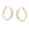 Thumbnail Image 1 of Previously Owned - 1/2 CT. T.W. Diamond Channel-Set Oval Hoop Earrings in 14K Gold