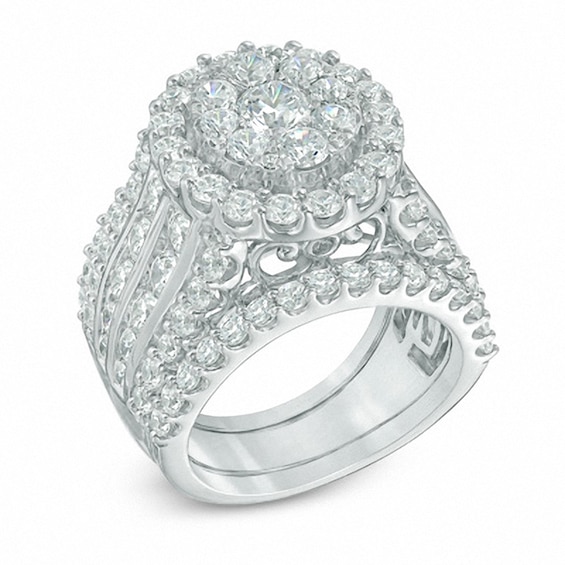 Previously Owned 5 CT. T.w. Oval-Shaped Multi-Diamond Frame Soldered Bridal Set in 14K White Gold