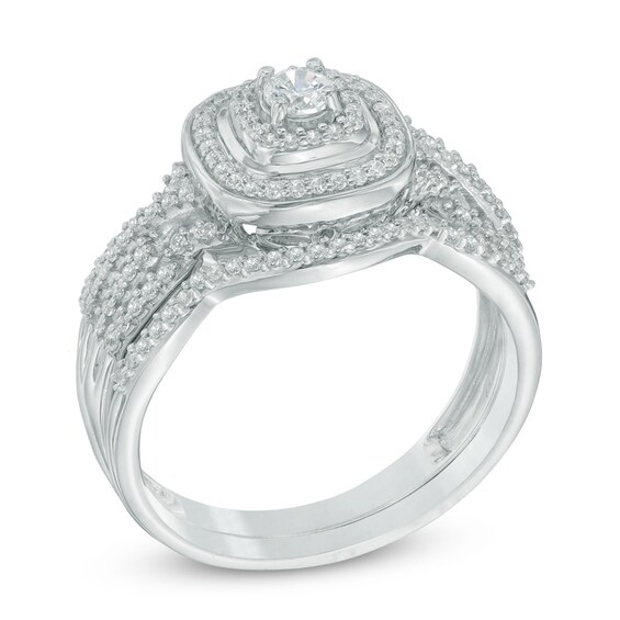 Previously Owned 1/2 CT. T.w. Diamond Cushion Frame Twist Shank Soldered Bridal Set In 10K White Gold