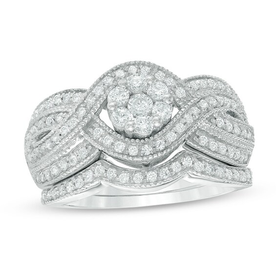 Previously Owned - 3/4 CT. T.w. Diamond Composite Crossover Bridal Set in 10K White Gold