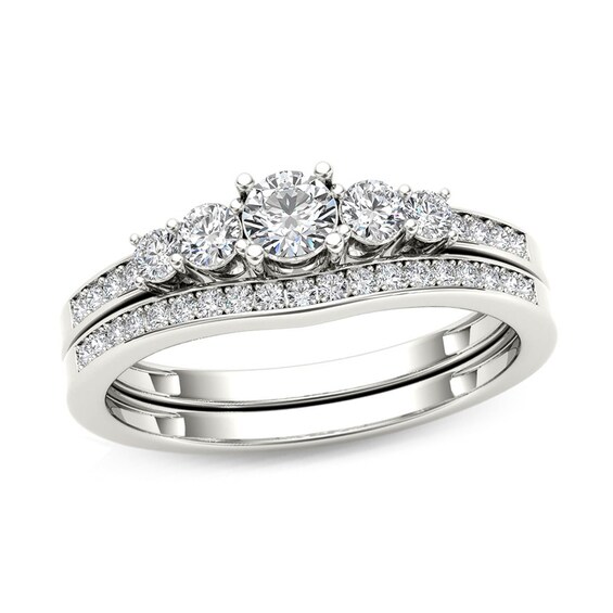 Previously Owned - 1/2 CT. T.w. Diamond Five Stone Bridal Set in 14K White Gold