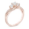 Thumbnail Image 2 of Previously Owned - 3/4 CT. T.W. Diamond Past Present Future® Twist Engagement Ring in 14K Rose Gold