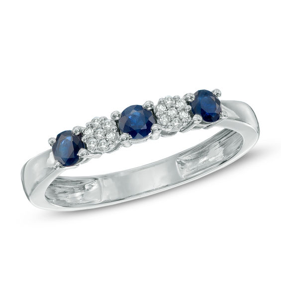 Previously Owned - Blue Sapphire and 1/20 CT. T.w. Diamond Three Stone Band in 10K White Gold