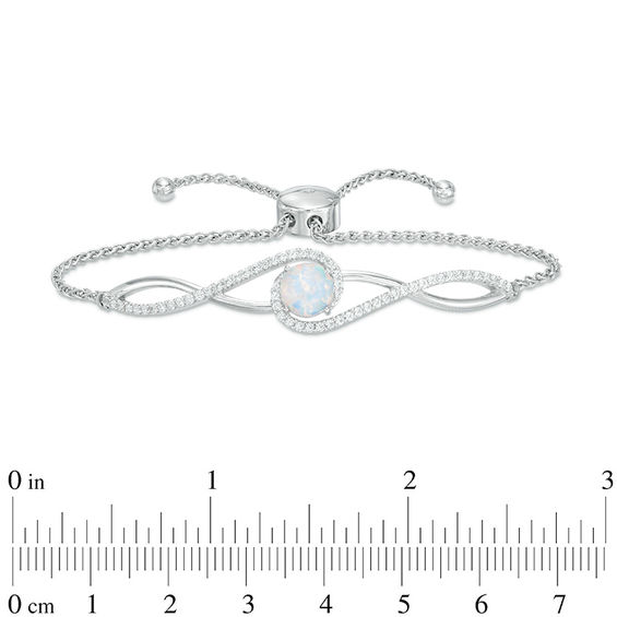 Previously Owned - 7.0mm Lab-Created Opal and White Sapphire Twisted Bypass Bolo Bracelet in Sterling Silver - 9.0"