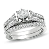 Thumbnail Image 1 of Previously Owned - 1-1/4 CT. T.W. Diamond Split Shank Bridal Set in 14K White Gold