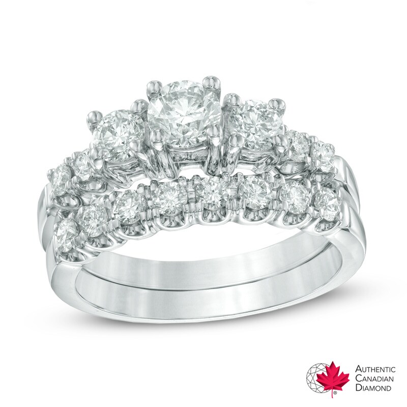 Main Image 1 of Previously Owned - 1-1/4 CT. T.W. Diamond Three Stone Bridal Set in 14K White Gold (I/I1)