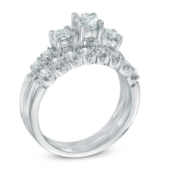 Previously Owned - 1-1/4 CT. T.w. Diamond Three Stone Bridal Set in 14K White Gold (I/I1)