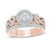 Thumbnail Image 1 of Previously Owned - 3/4 CT. T.W. Diamond Frame Braided Infinity Bridal Set in 14K Two-Tone Gold